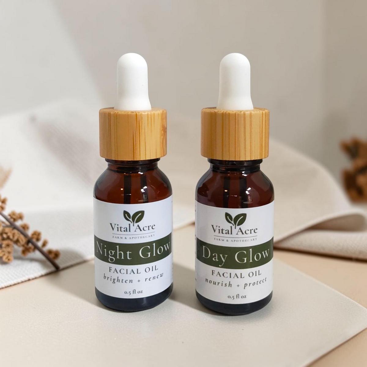 Vital Acre Farm & Apothecary Day and Night facial oil set in amber glass dropper bottles with wooden caps.