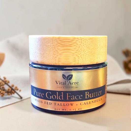 Vital Acre Farm & Apothecary Pure Gold Tallow Face Butter in a glass jar with a wooden lid for dry sensitive skin