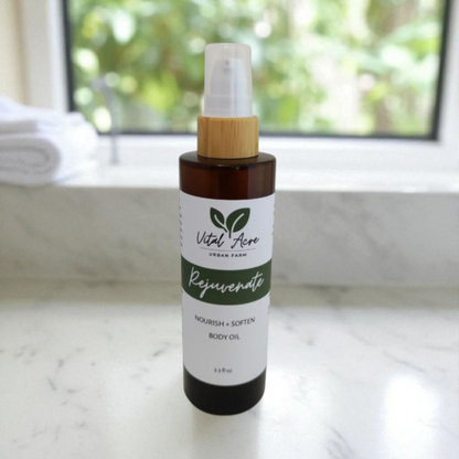 Body oil bottle on a marble surface with a blurred greenery background