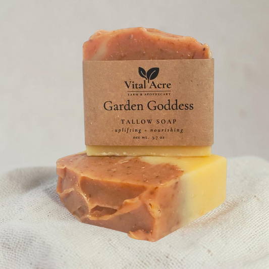 Vital Acre Farm & Apothecary Garden Goddess tallow soap bar with botanical swirls and a rustic paper label.
