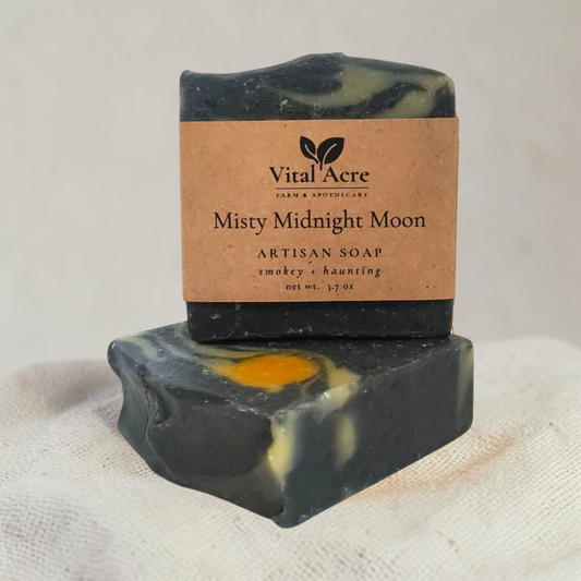 Vital Acre Farm & Apothecary Misty Midnight Moon artisan soap bar with dark charcoal and orange swirl design.